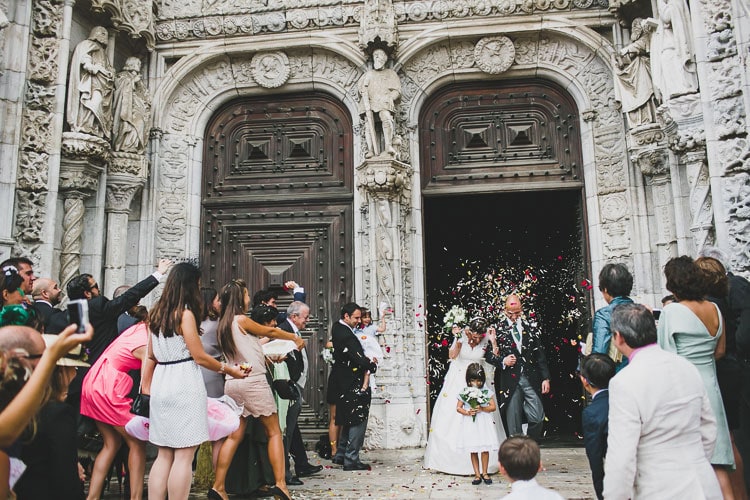 first kiss at vintage wedding in lisbon monastery of jeronimos