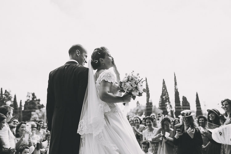 first kiss at vintage wedding in lisbon monastery of jeronimos
