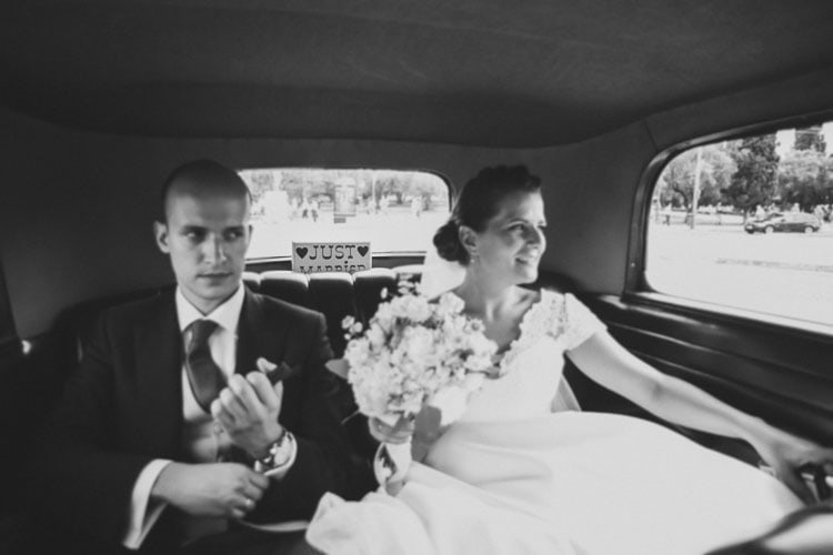 after the ceremony, photography of bride and groom in a old vintage car in portugal vintage old car ford for a wedding small elopment