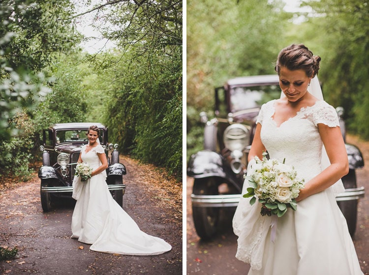 bride in love in front of a old vintage ford car for weddings in Lisbon portugal by jesus caballero photography