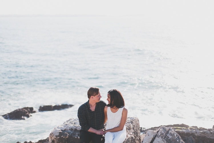 intimate exchange of vows at the beach in a small elopement in Portugal, by obidos wedding photographer jesuscaballero.com destination spot surf Peniche, little california