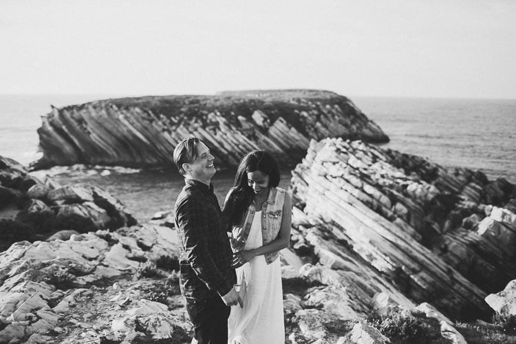 intimate exchange of vows at the beach in a small elopement in Portugal, by obidos wedding photographer jesuscaballero.com destination spot surf Peniche, little california