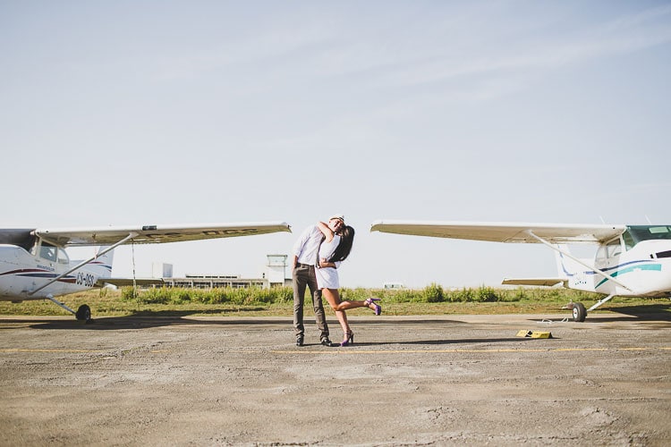 vintage photographer in a hangar on the aerodrome in Porto for a pre wedding
