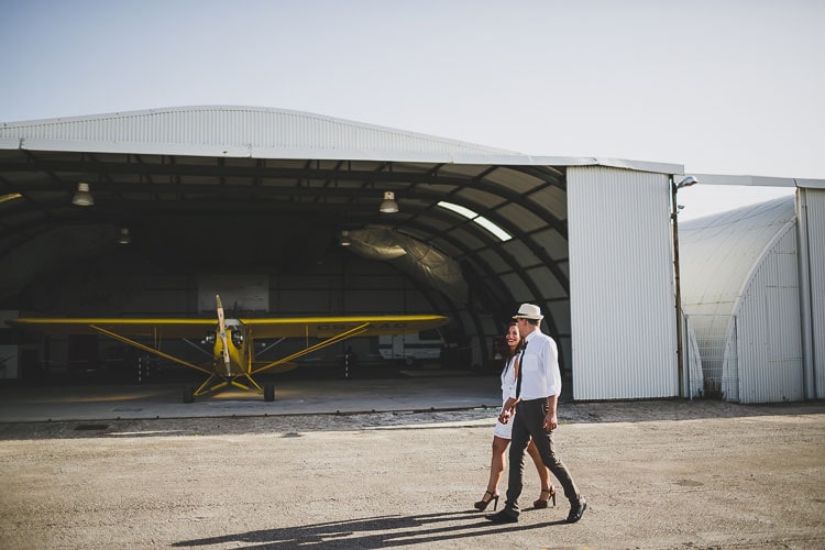 europe elopement in portugal with vintage hangar and planes