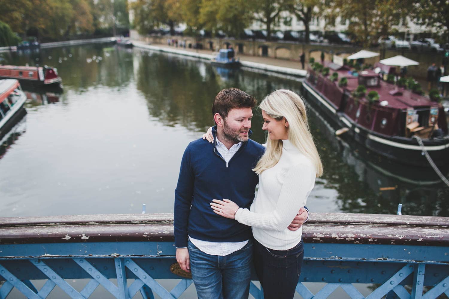 couple engaged in bridge at little venice