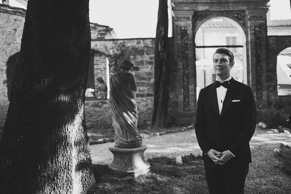 groom waiting for the first look at tuscany wedding