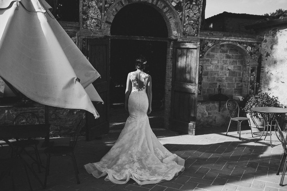bride at first look in tuscany wedding at borgo casabianca