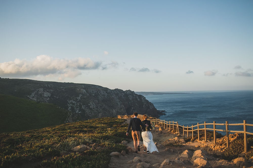 couple at cabo da roca ursa beach elopement