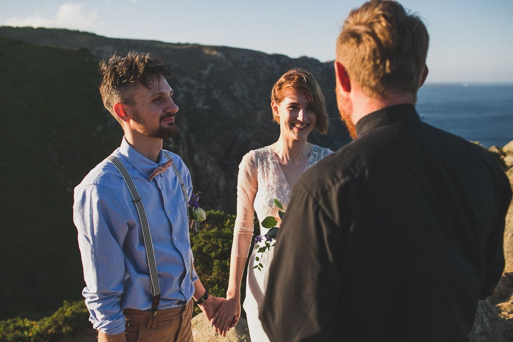 bride and groom in elopement at cliffs