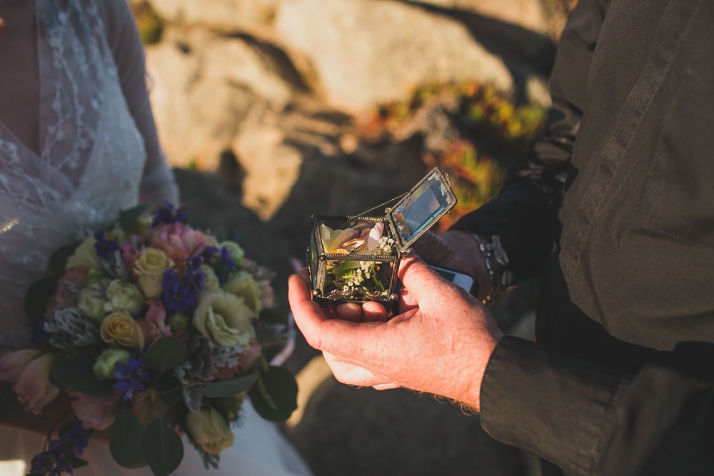 rings and flowers in real religious elopement