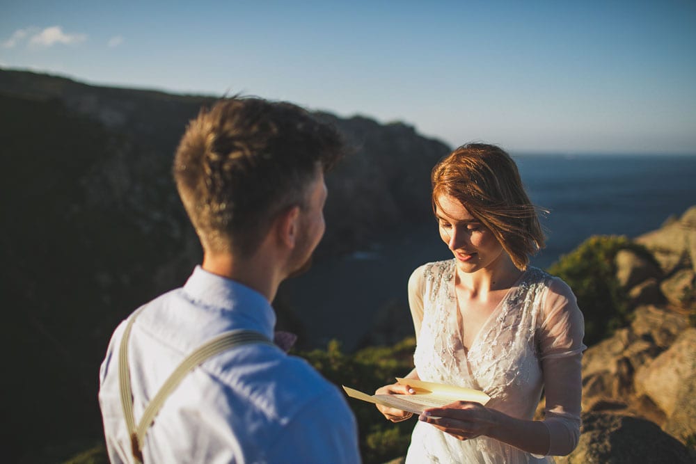bride reading vows in elopement in cabo da roca portugal europe