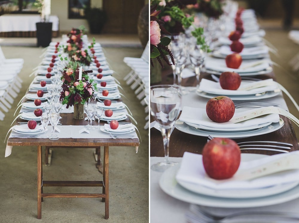 red apples placed on each plate wedding