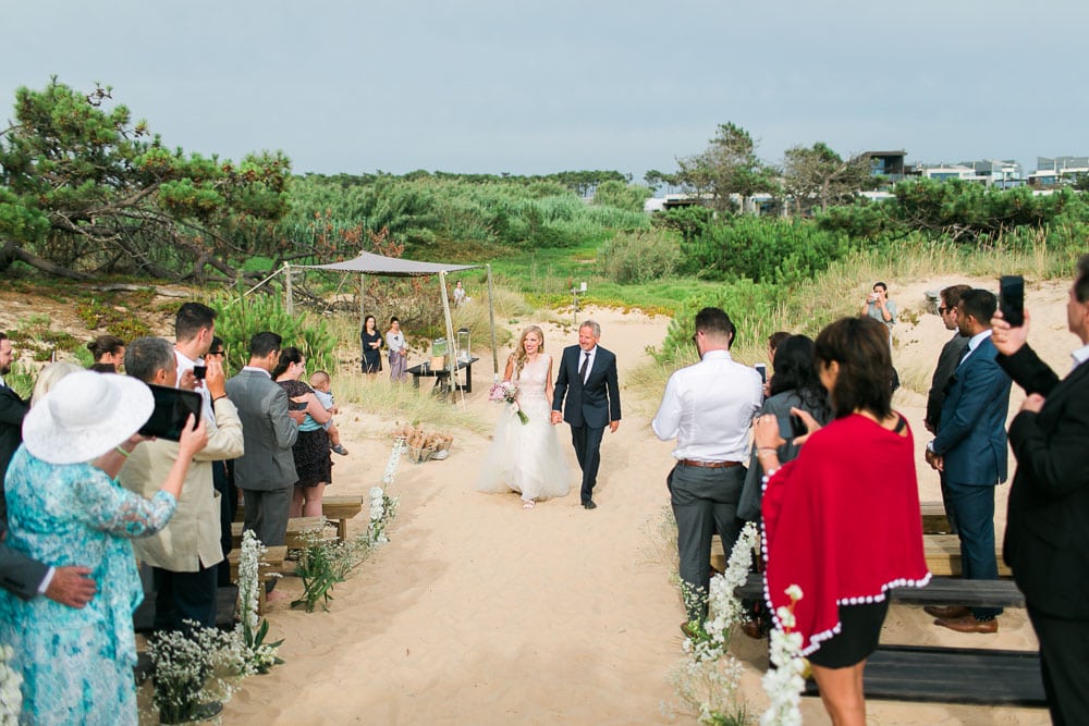 bride walking down aisle beach wedding areias do seixo
