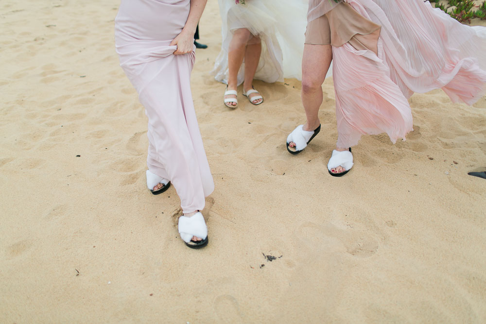 bridesmaids slides shoes areias do seixo beach wedding photographer