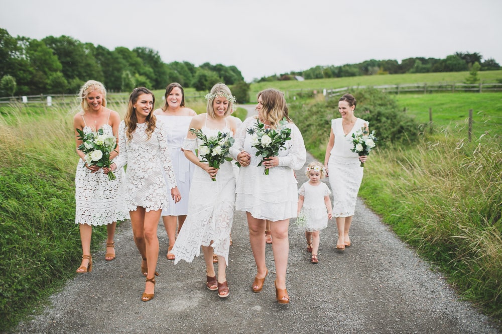 bridesmaids at countryside boho wedding during getting ready lewes sussex UK