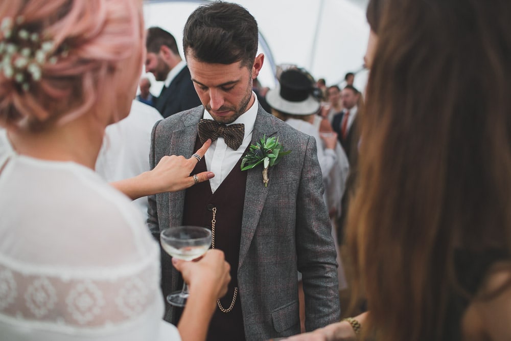 groom bow tie East Sussex Rainy Festival Wedding photographer