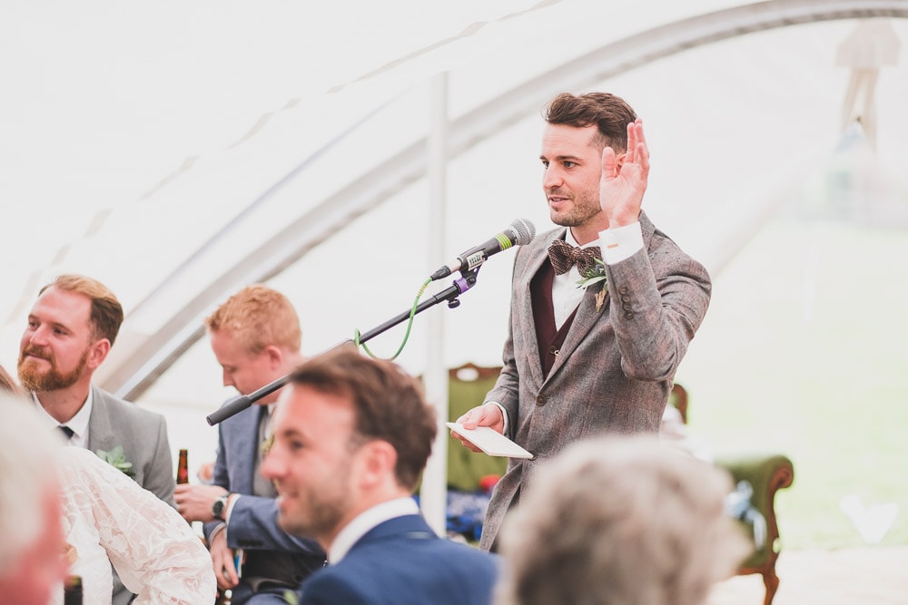 groom speech East Sussex Rainy Festival Wedding photographer rock my wedding