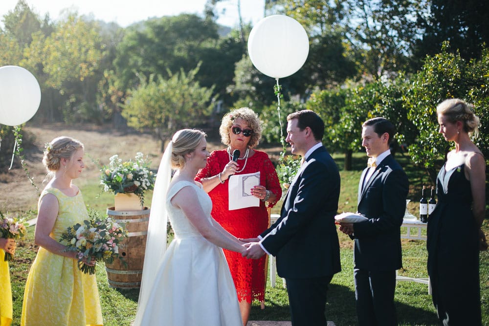vows during ceremony at quinta santa ana gradil #bride #smallwedding #vineyard #balloons #portugalphotographer #quintasantana #vineyard #vineyardwedding #outdoorceremony www.jesuscaballero.com