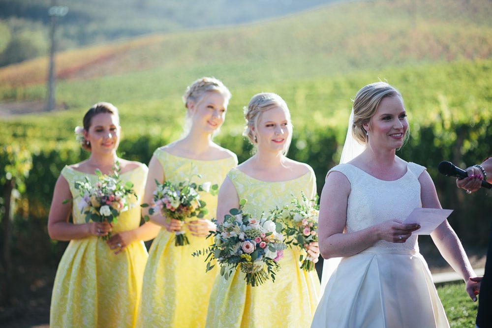 bridesmaids and bride in vineyard ceremony in Portugal 