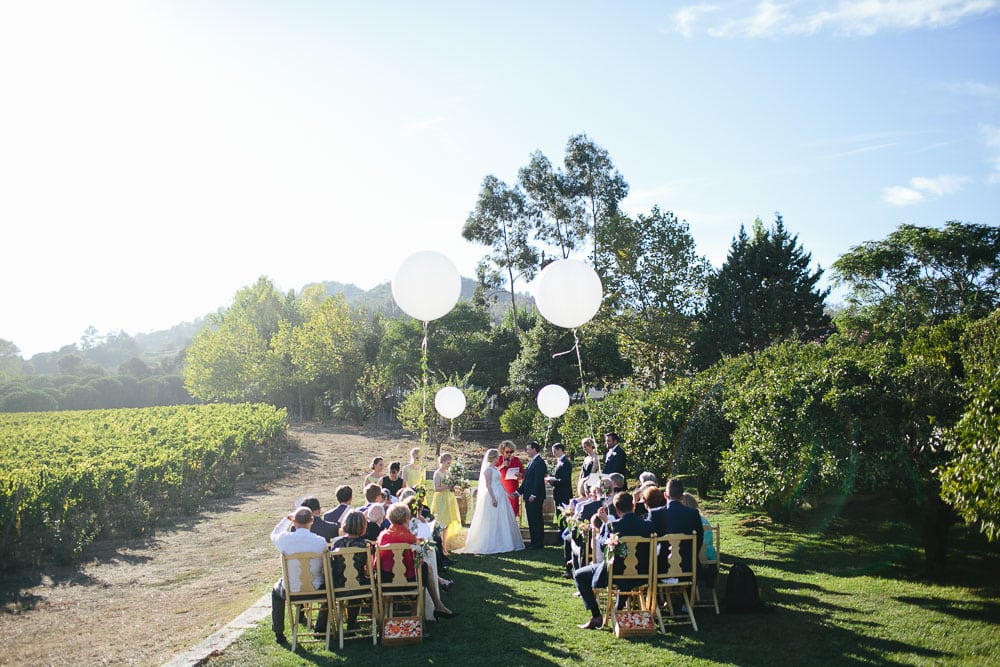 outdoor ceremony with balloons at the vineyards of quinta santa ana