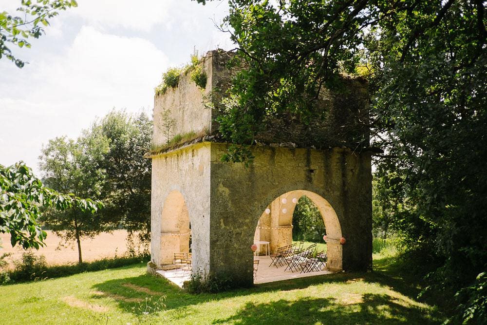 ceremony stone archs in Chateau Puissentut for rustic french wedding www.jesuscaballero.com #rusticwedding #rustic #minimalist #countryside #frenchwedding #ChateauPuissentut www.jesuscaballero.com