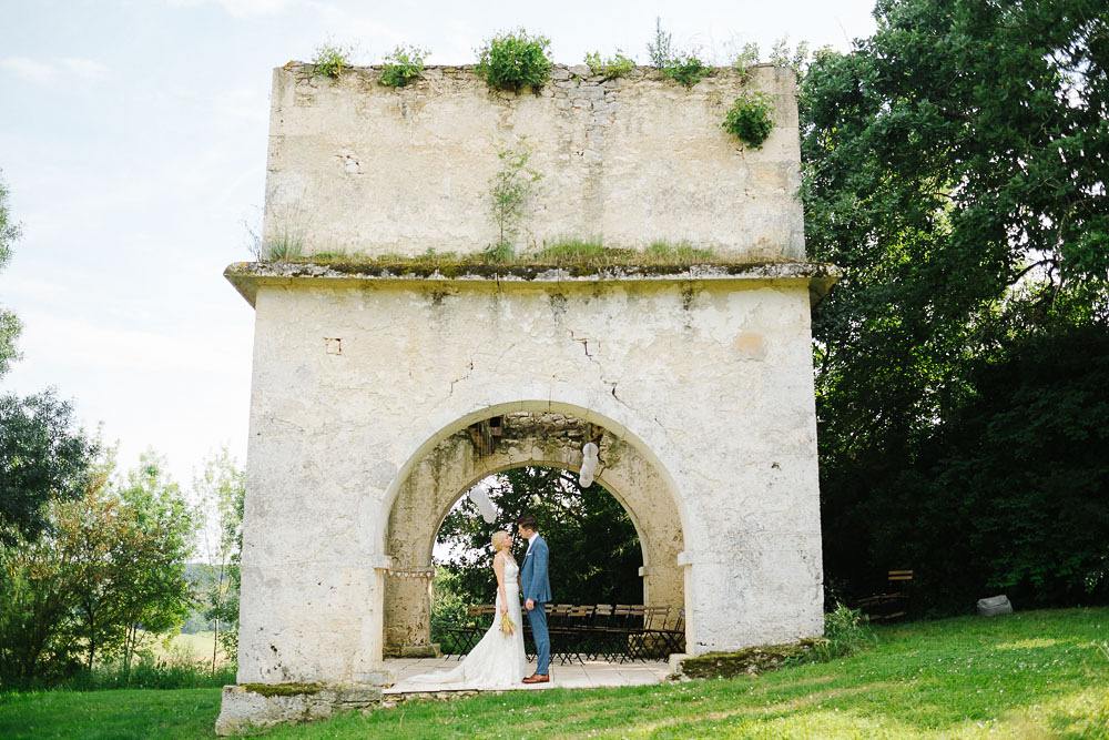 couple portraits at france rustic wedding chateau puissentut