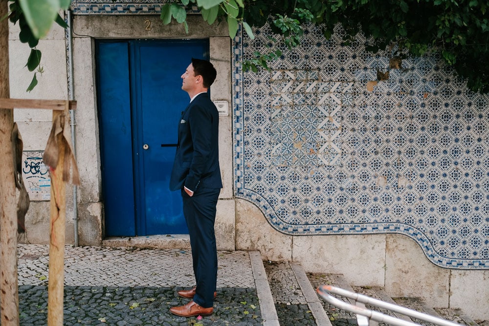 groom waiting for the first look at lisbon elopement #firstlook elopement #lisbonelopement #urbanelopement #lisbonphotographer #portugalwedding #tiles #lisbontiles