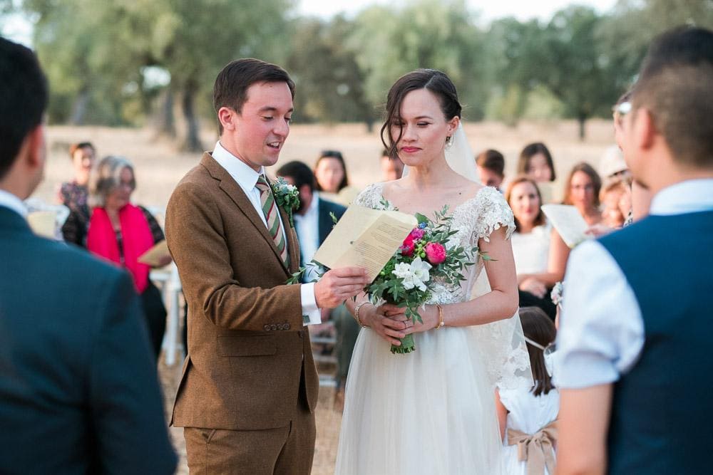 vows and rings exchange at countryside wedding in Alentejo