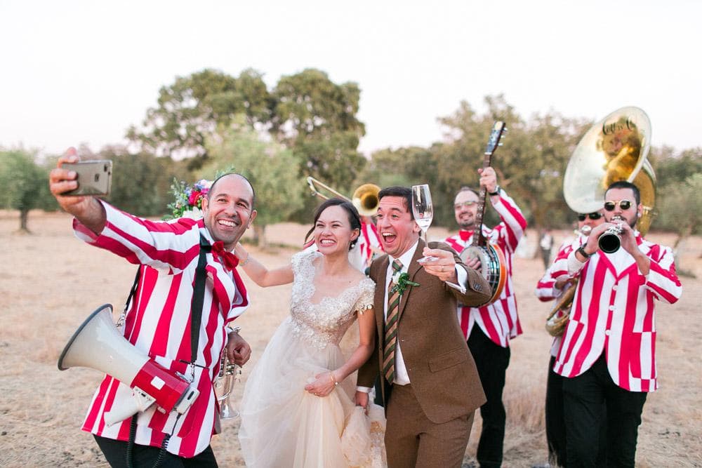 Brass band and newlywed couple Rustic boho wedding at countryside Alentejo Herdade dos Alfanges #rusticwedding #countryside #brassband jesuscaballero.com