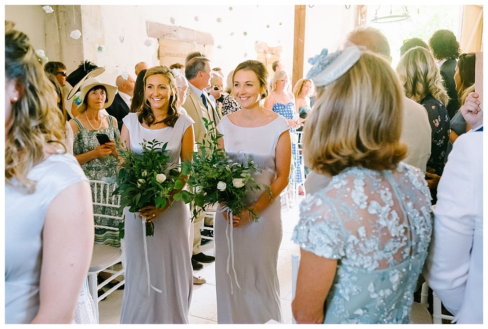 bridesmaids walking down the aisle at chateau wedding #chateauwedding #bridesmaids #franceweddingphotographer #toulousewedding #frenchwedding jesuscaballero.com
