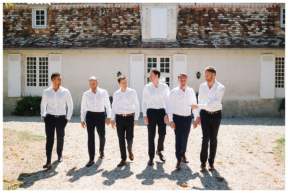 groom with best man, groomsmen and ushers before the wedding