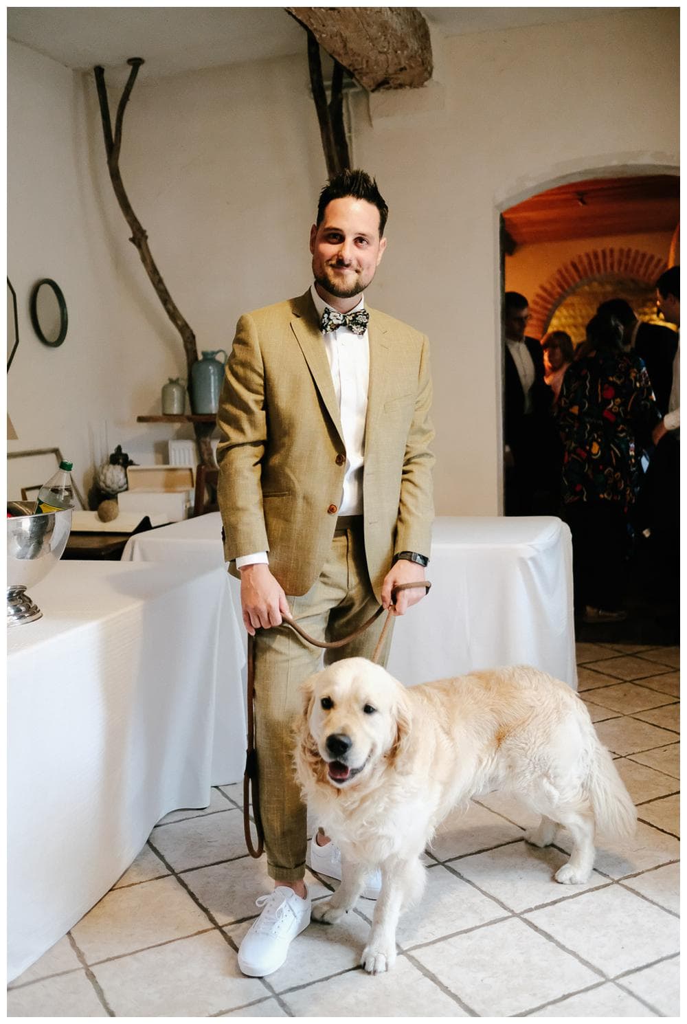 groom ready with his dog for a french destination wedding