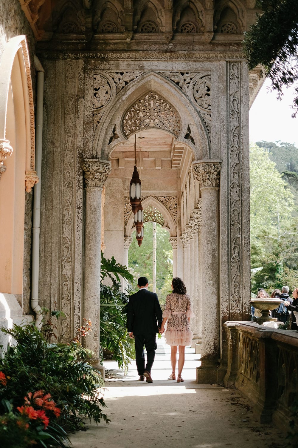 romantic palace in sintra with a couple in background