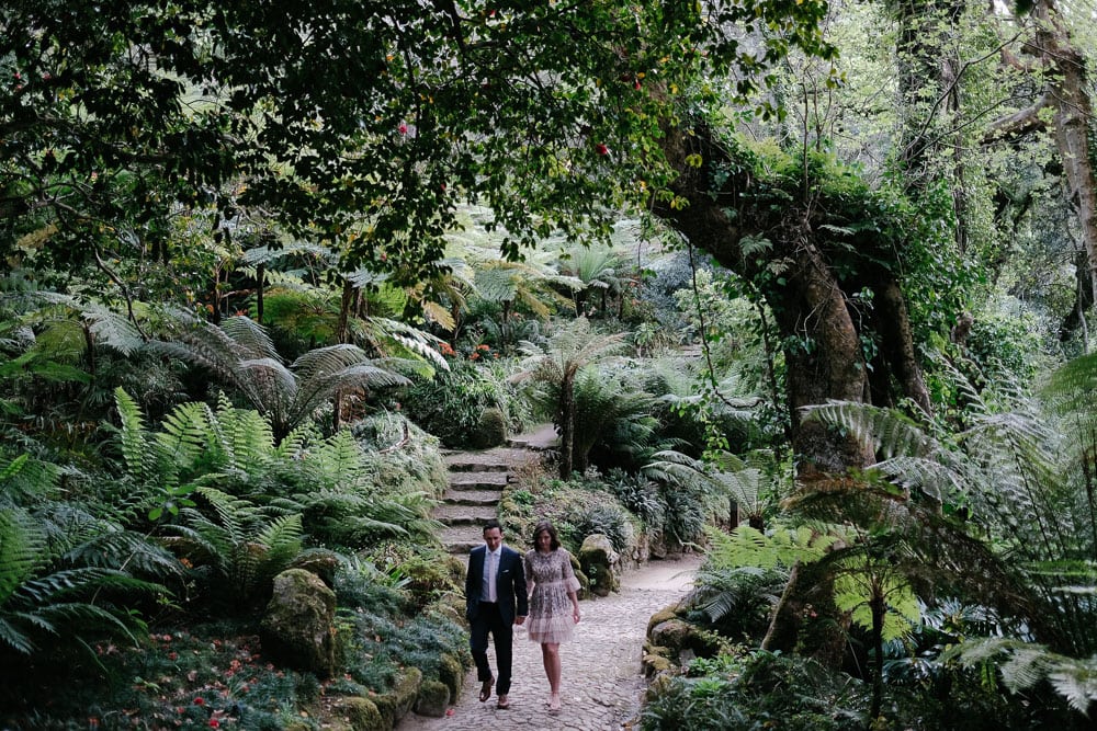couple walking by the forest on their nature outdoor elopement