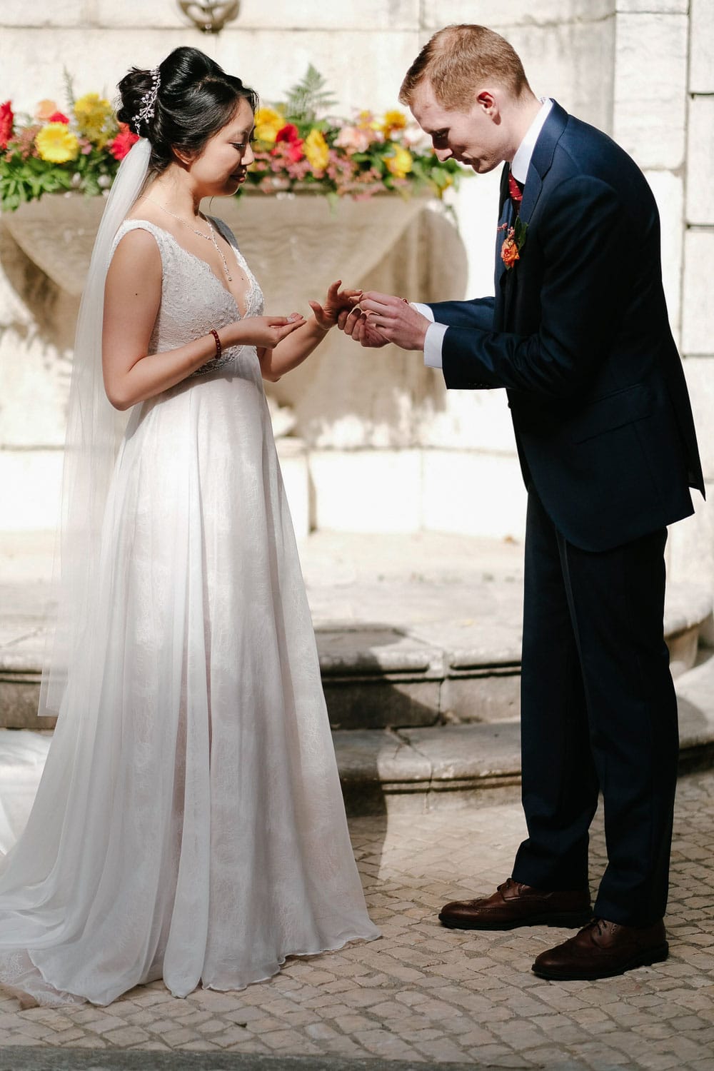 rings exchange during intimate wedding in lisbon