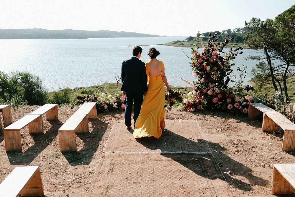 rustic wedding at rio do prado with platform for Ceremony overlooking the lake in Obidos #sarahseven #bridedress #riodoprado #yellowweddingdress #elopement #platformceremony #lakewedding #lagoonwedding