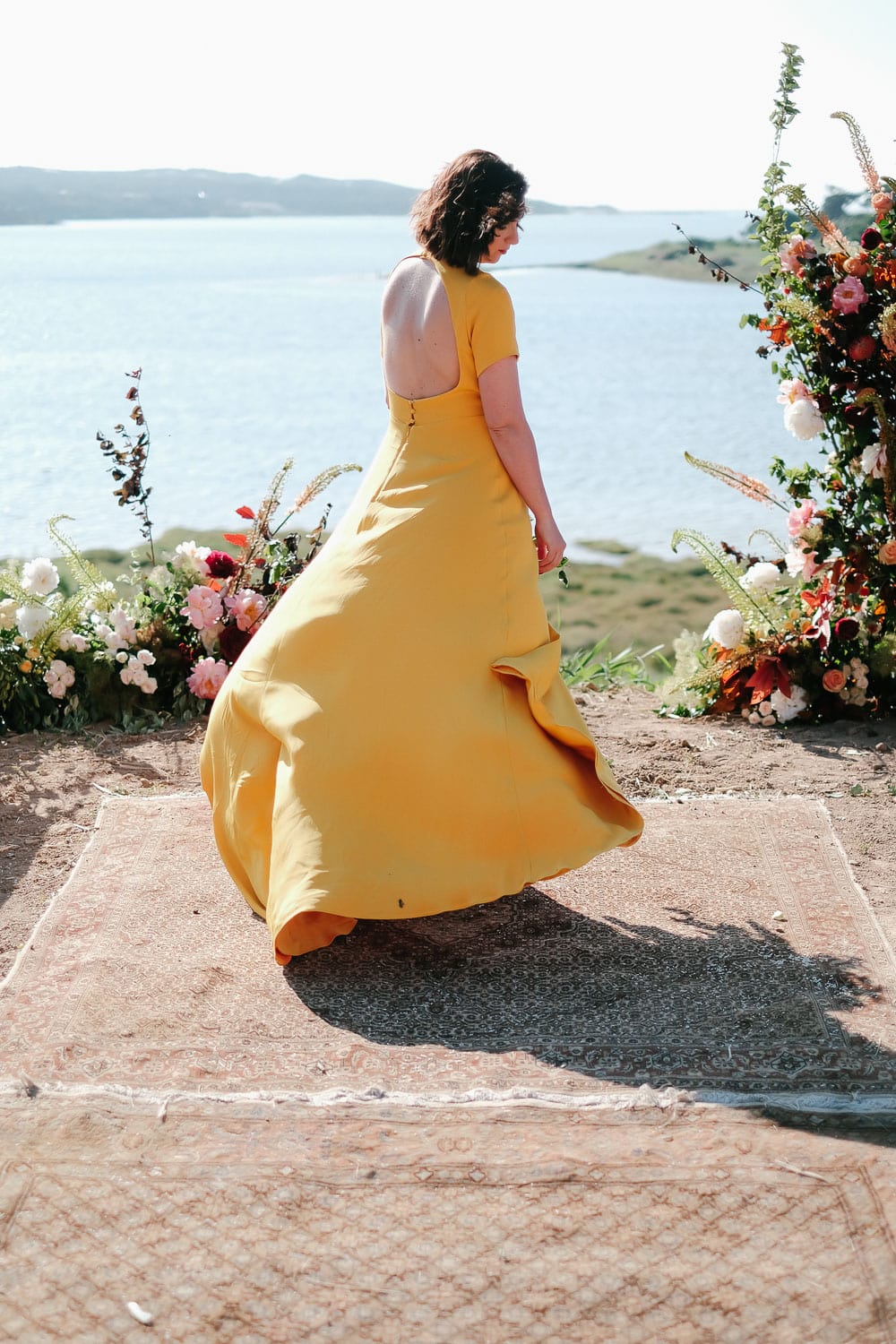 bride with sarah seven yellow wedding dress perfect for elopement #sarahseven #bridedress #yellowweddingdress #elopement