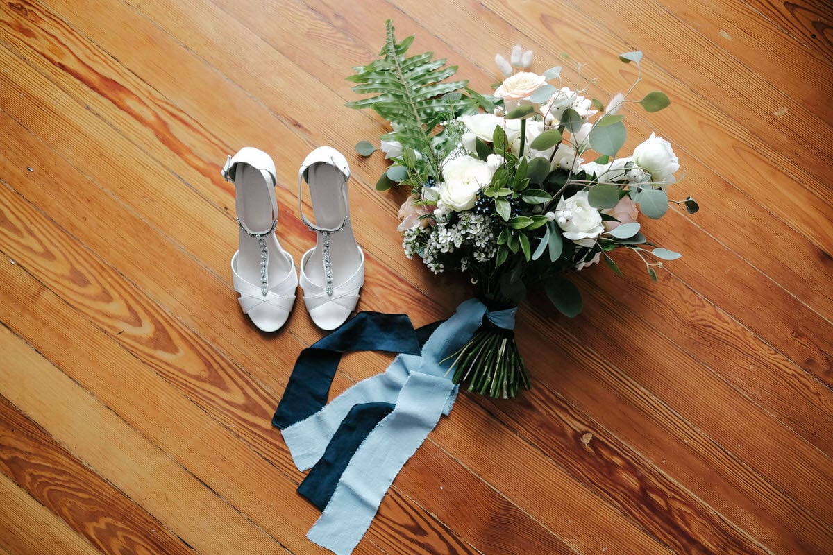 jeweled shoes from David's Bridal and bouquet elegant and wild with protea, garden roses, lisianthus, wax flowers, privet berries, eucalyptus in Lisbon wedding by florist Green Pick Lisbon #greenpick #lisbonflorist #wildbouquet #jeweledshoes #DavidBridal