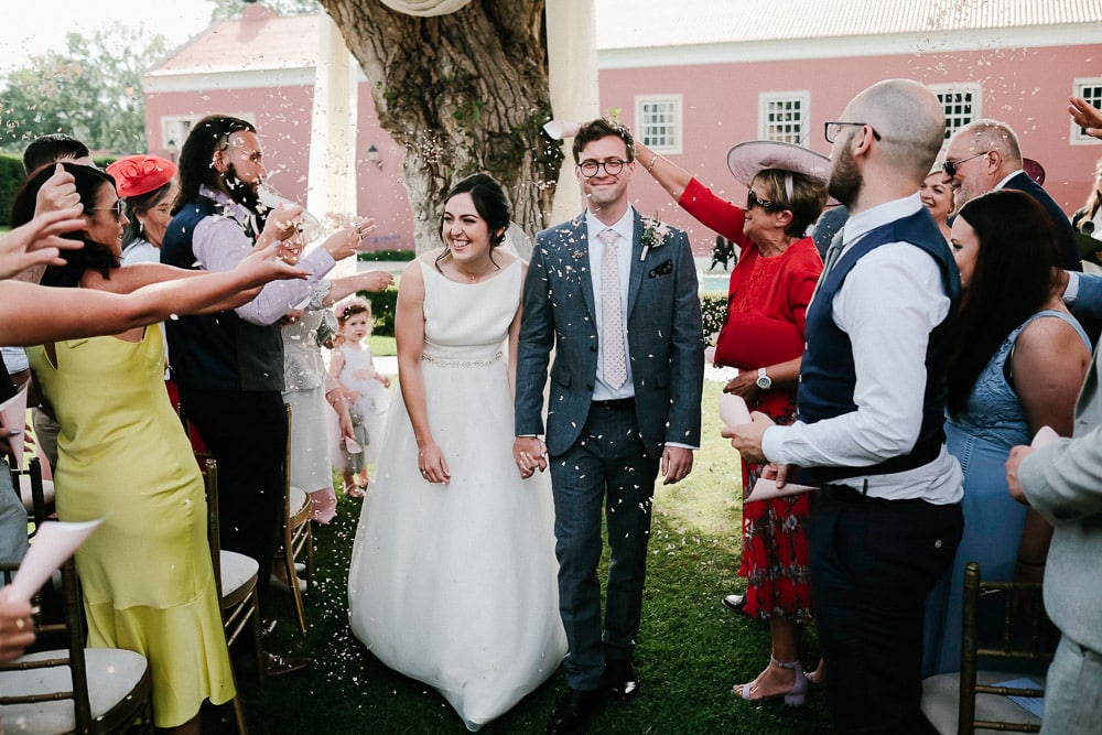 exit and petals at an outdoor rustic wedding in Penha Longa