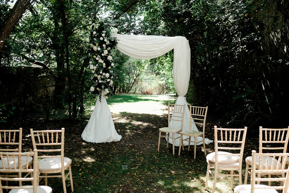 aisle canopy with silk and flowers