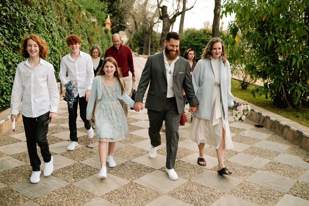 family walking really early in Seville for an intimate elopement in Seville