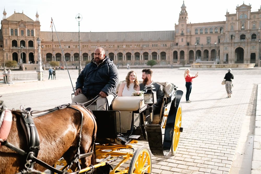 typical horse carruage in plaza de españa for elopement in seville